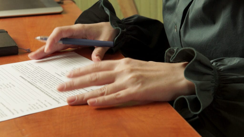 woman signing contract